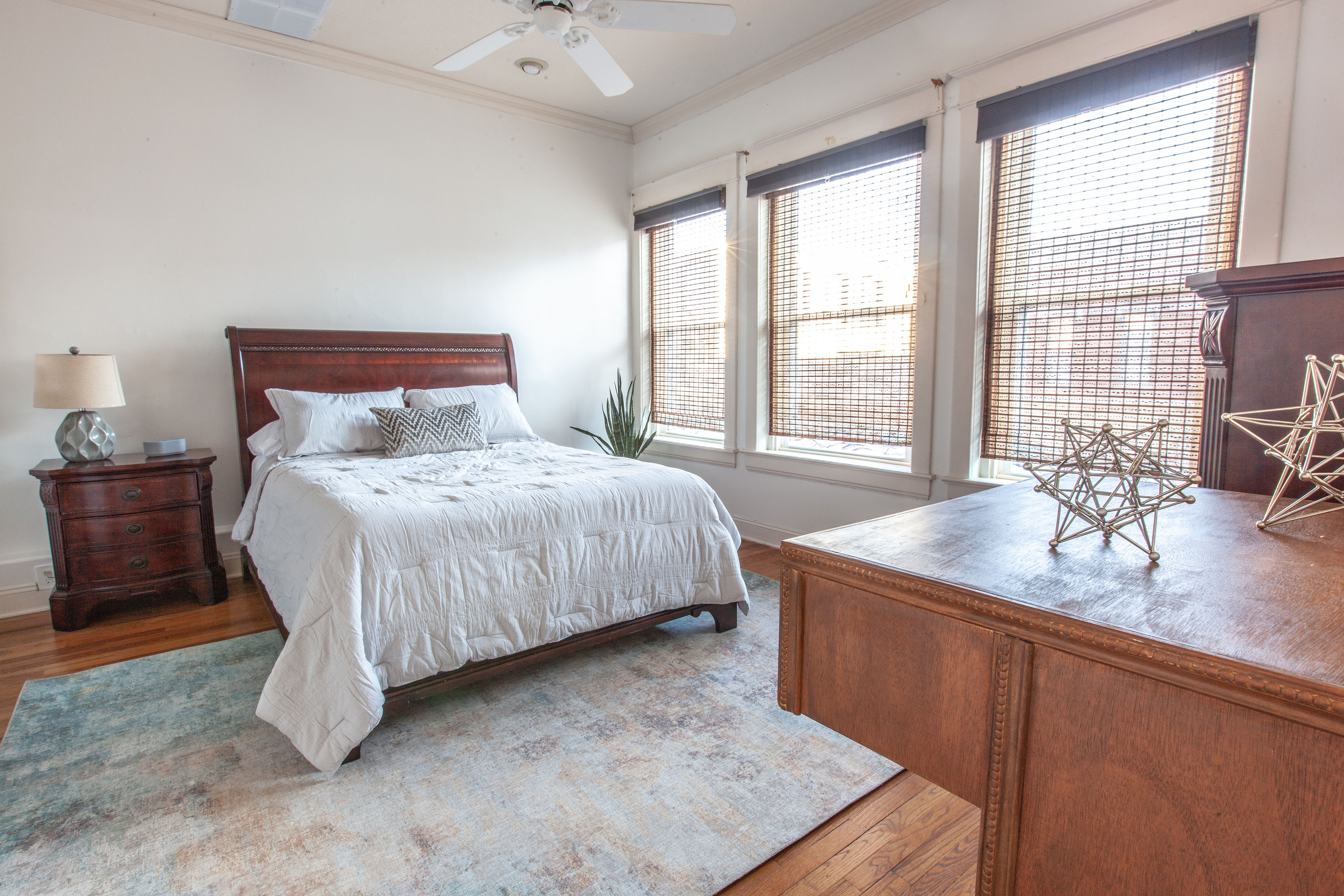 Loft B master bedroom with queen bed at Three Trails Lofts on Independence Square
